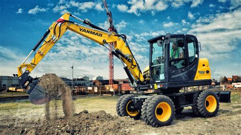 mini excavator on wheels|compact wheeled excavator.